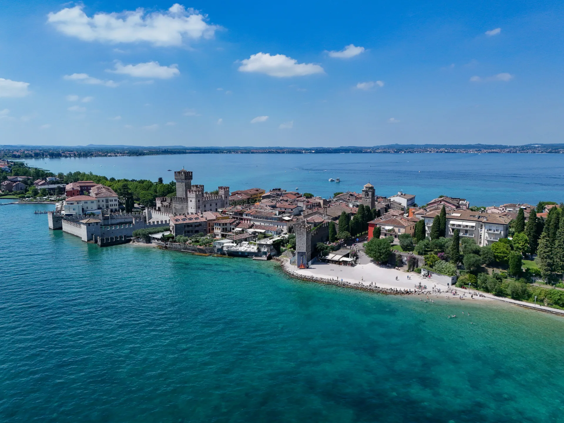 Aerial view of old town of Sirmione surrounded by the Garda Lake